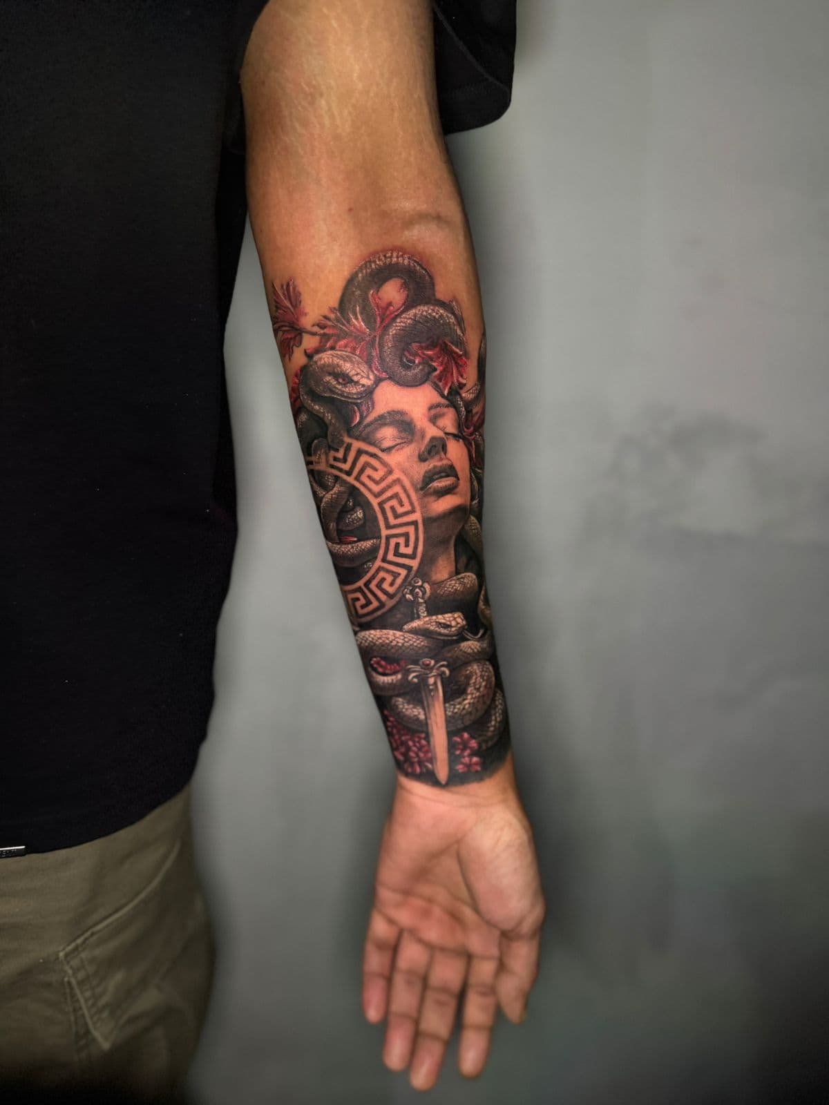 Fine line lettering tattoo on neck by TATTOOMI artist