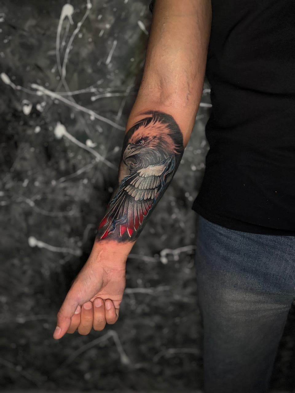 Tattoo artist at work inside TATTOOMI studio, Greater Kailash 2